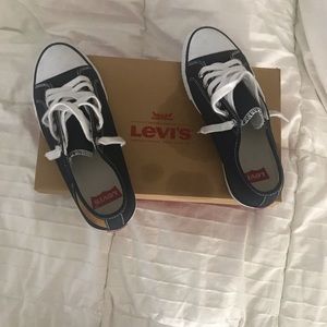 Used. Levi “converse” style.